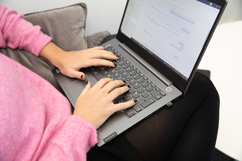 Microsoft solution assessments expert working on a laptop