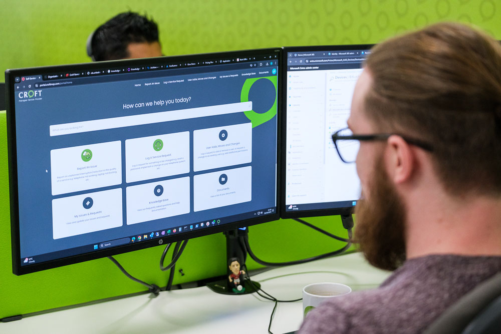 Croft IT solutions expert working at a desktop PC