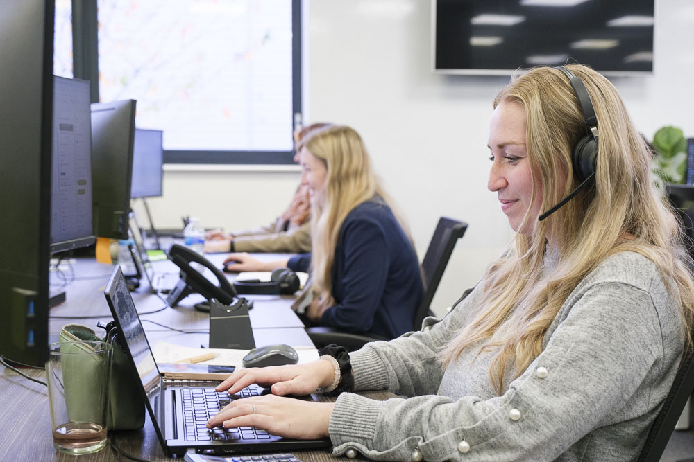 Knowledge base expert working at a desktop computer